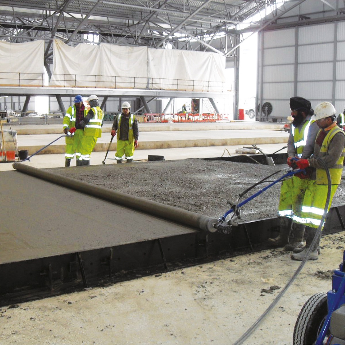 This concrete levelling hydraulic machine. The Bunyan Striker is powered by a diesel Kuboto engine. This machine connects to roller tubes which flatten out the concrete on the slab. Available from Speedcrete, United Kingdom.