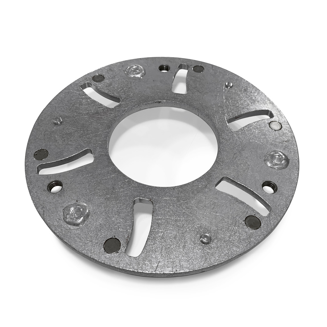 Grinding concrete abrasive holder for magnetic diamond grinding discs. This plate is designed to slot into the planetary arm plate system which can be attached to pedestrian and ride-on concrete trowels.
