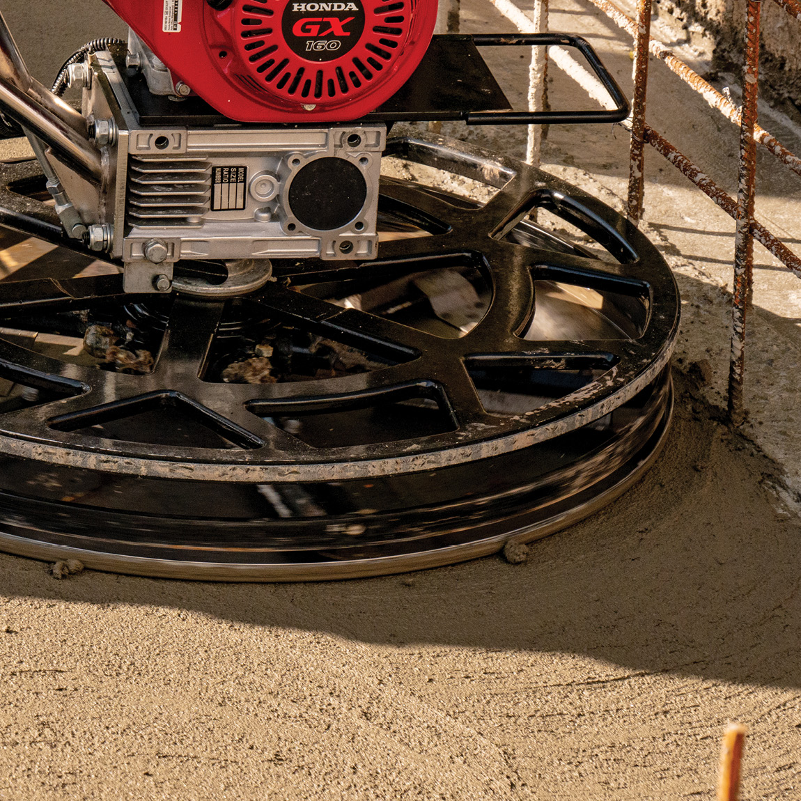 Pedestrian walk-behind trowels for concrete finishing. This petrol powered Honda GX160 comes with a removable pan and has 6 blades. Available in the United Kingdom Via Speedcrete.