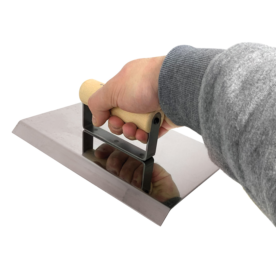 The 10 In. long stainless steel blade moves smoothly along the edge of concrete slabs. The tool is designed to produce a bevel edge on a concrete slab. This edger creates a 45° radius on the edge to prevent chipping with wear. Speedcrete, United Kingdom.