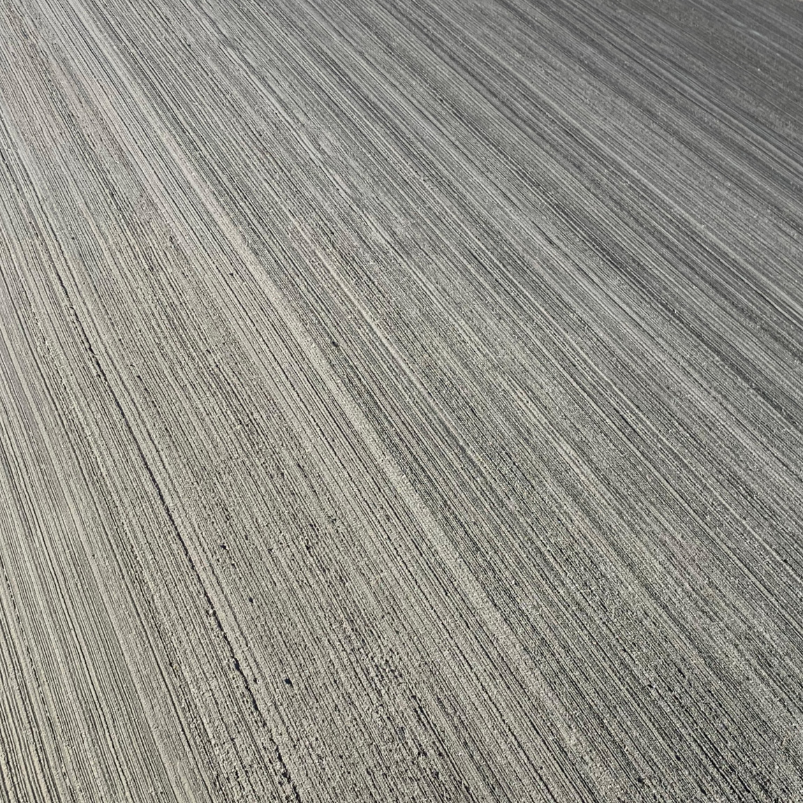 Concrete texturing brooms can be dragged across concrete to add a high grip finish. This sturdy wooden brush head houses the steel bristles. Available to purchase in the United Kingdom via Speedcrete.